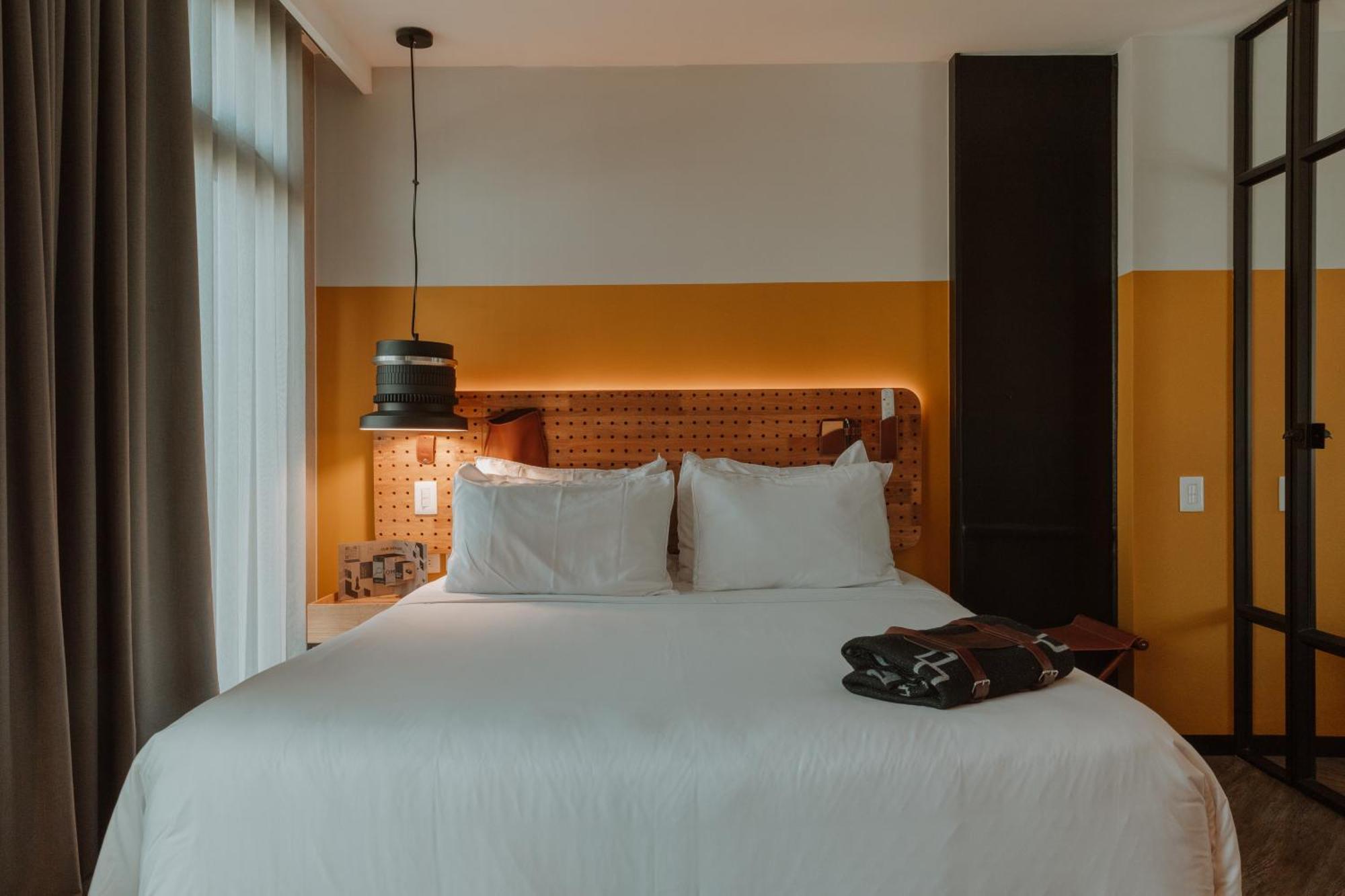 The Click Clack Hotel Medellín Exteriér fotografie A room at the hotel